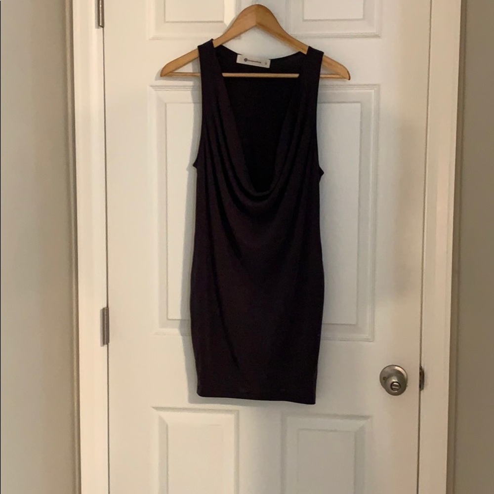 Razor body con dress. 64% Modal 36% Polyester